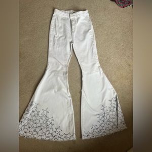 Free people bell bottom jeans with embroidered stars